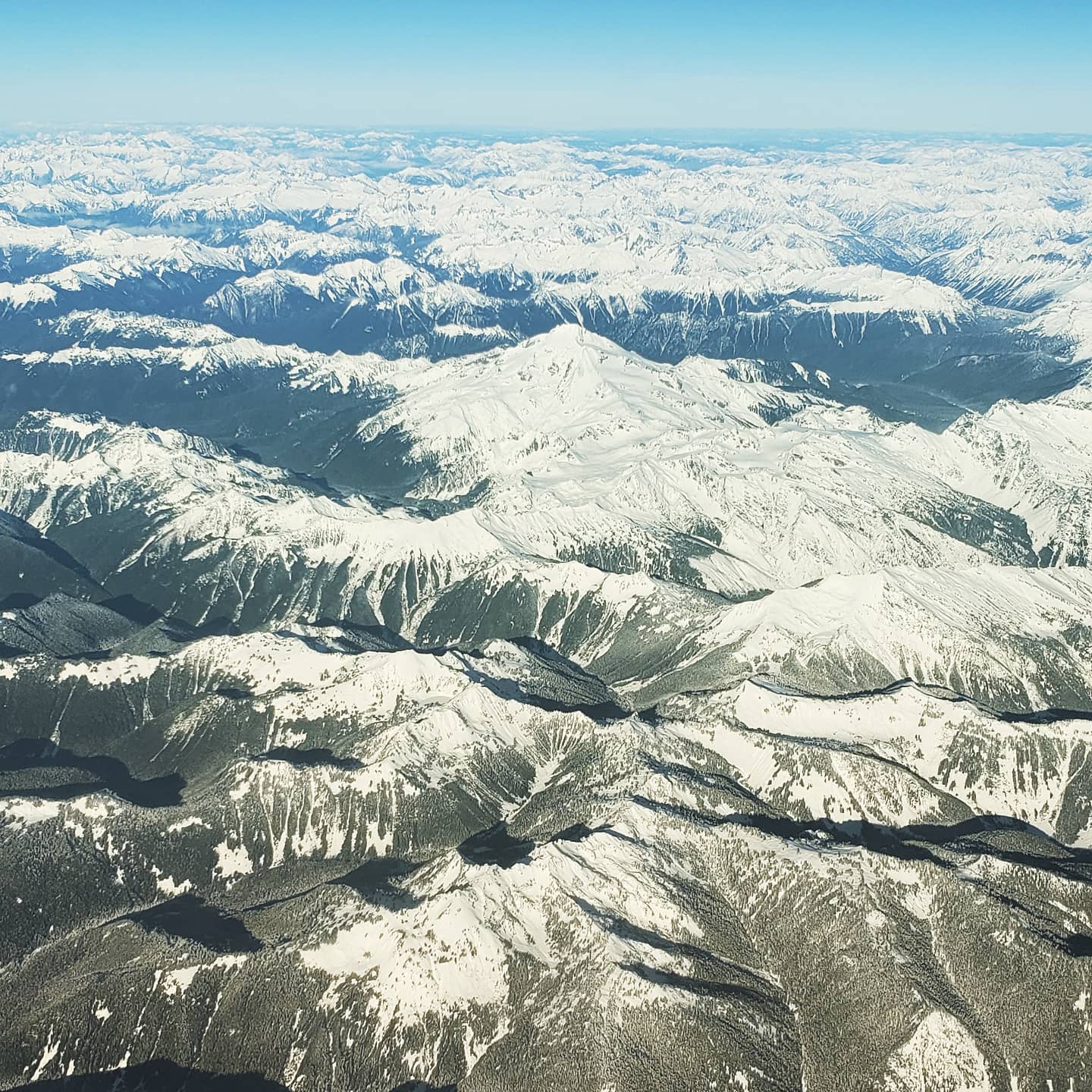 #thecascades #almosthome #noplacelikehome #snowmountains #fromabove